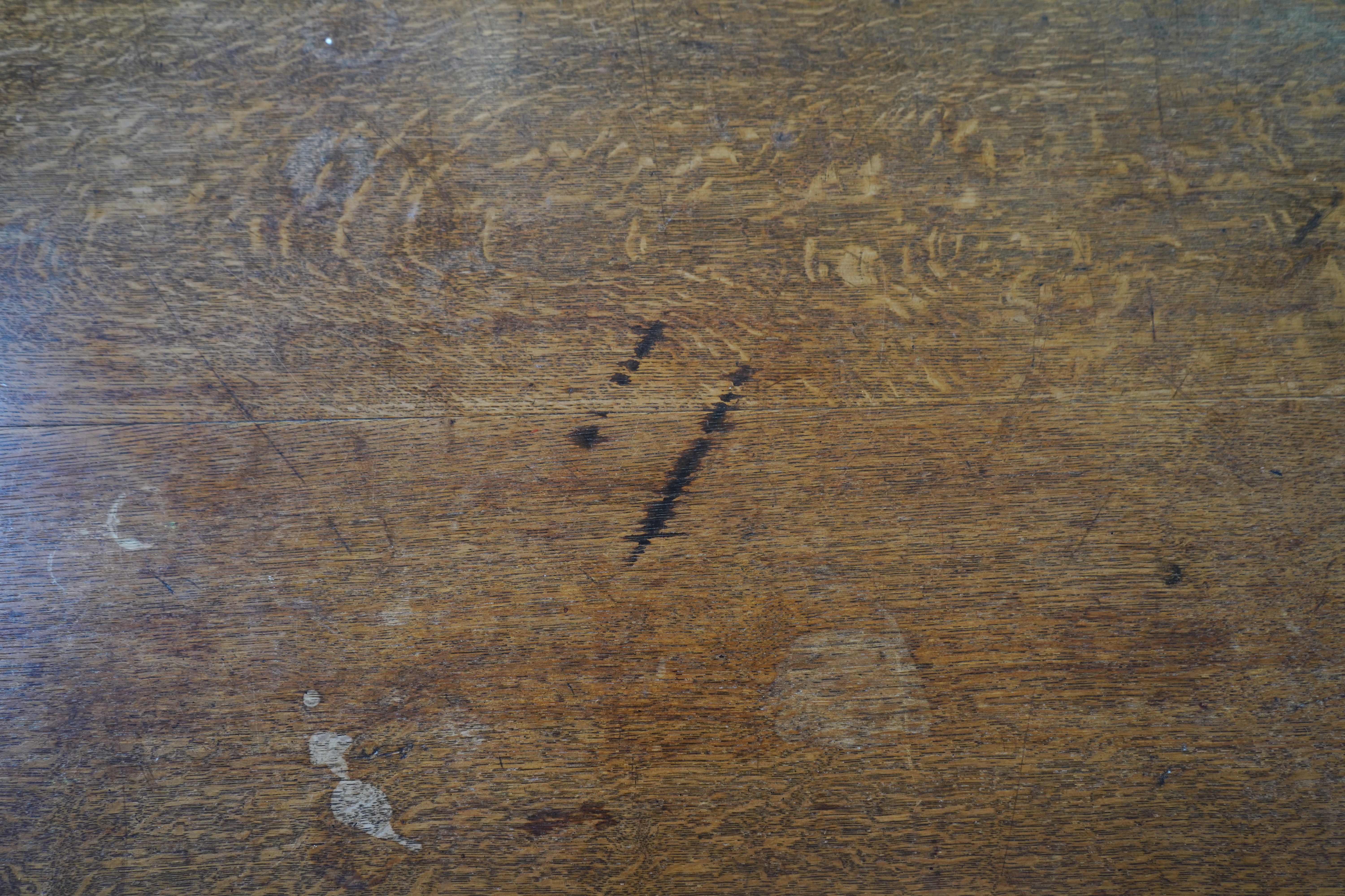 An Arts and Crafts oak refectory dining table